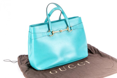 Best designer label fashions and fashion accessories consignment in Dallas. This pre-owned Gucci Turquoise Tote with Horse Bit Hardware was recently offered in one of BRG's online estate auctions.